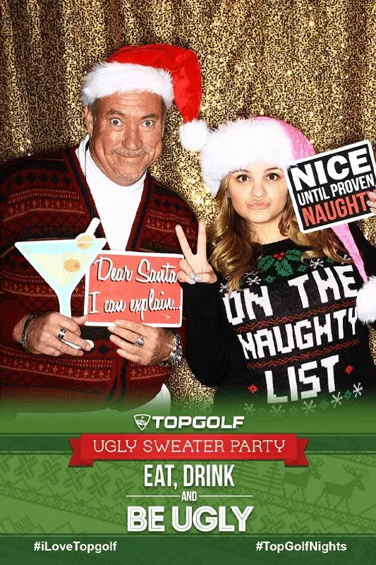 Photo Booth Rentals in Phoenix & Scottsdale - Ooh la la Holiday party guests posing at a festive Phoenix photo booth