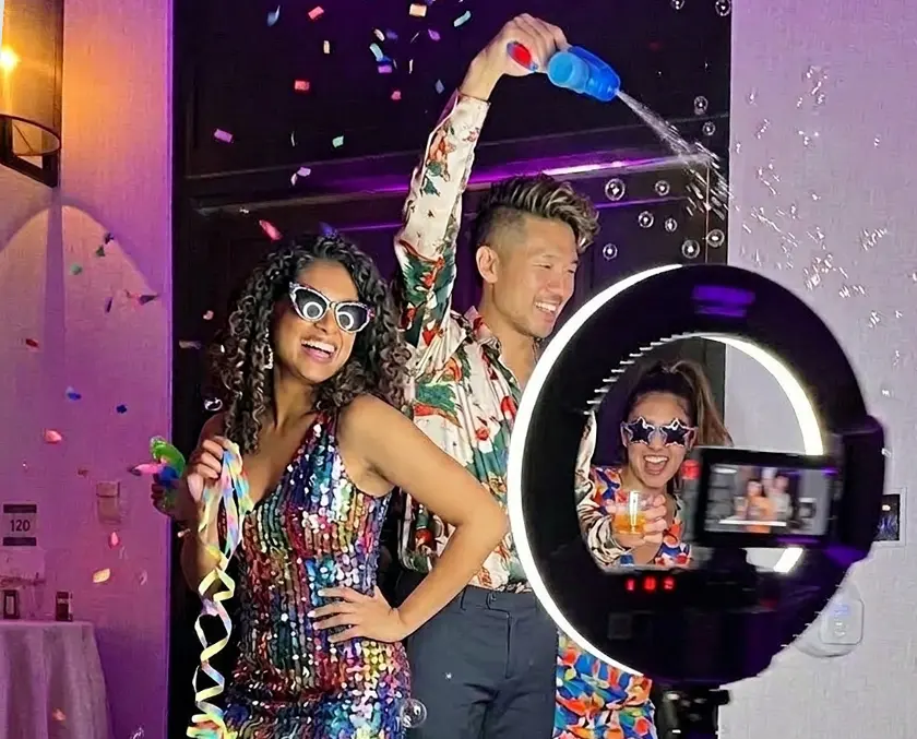 Rotating camera capturing slow motion video at a 360 photo booth event