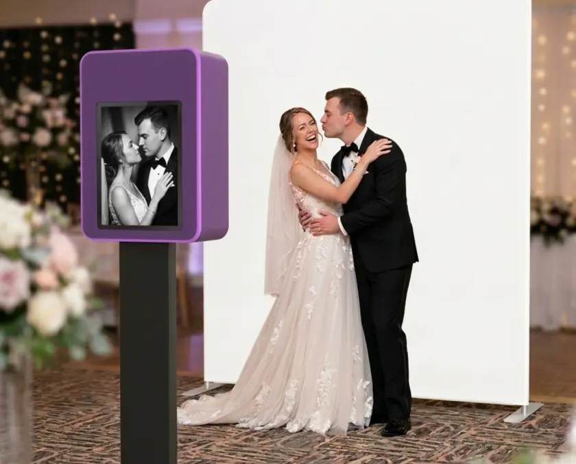 Bride and groom posing for a black and white glam photo booth portrait at a Scottsdale wedding reception